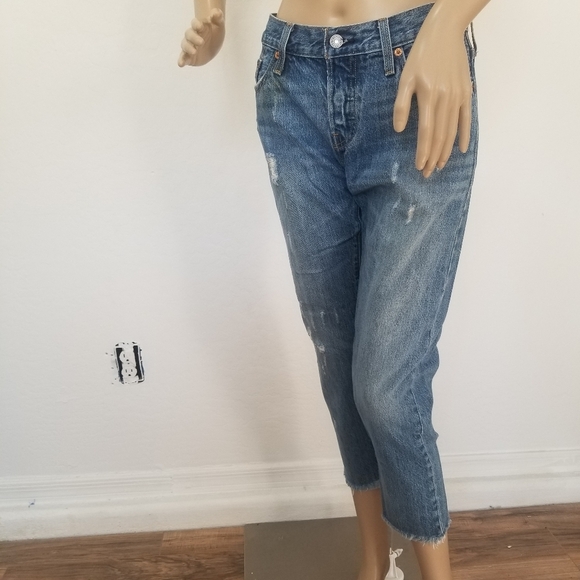Levi's Denim - 501 Levi's Medium Wash Distressed Button Fly Levi's Jeans.